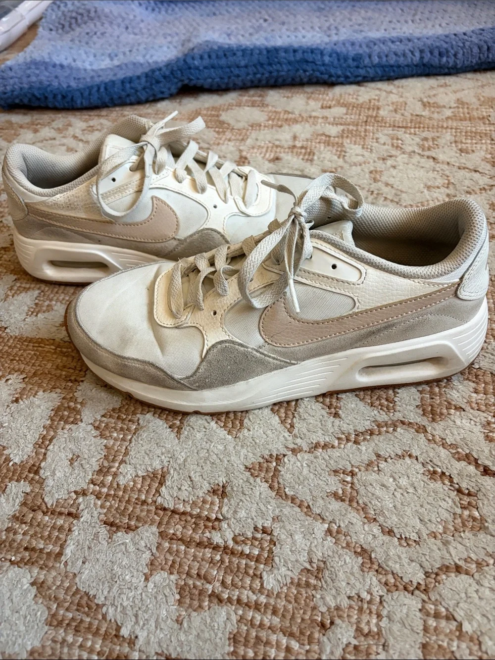 Nike off-white and beige low-top sneakers